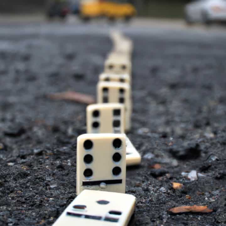 dominoes in middle of the road