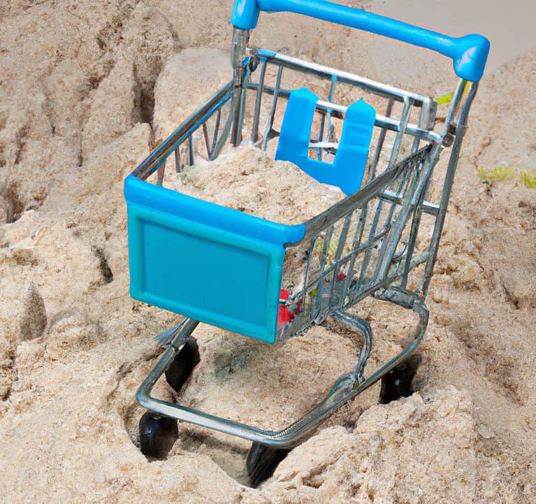 shopping cart in sand
