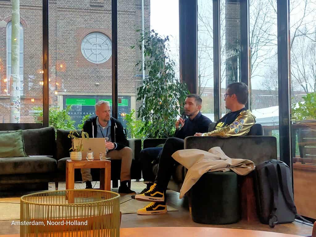 A picture of Thomas Theunen, Igor Faletski, and Sander Felius sitting on a coach for a panel discussion.