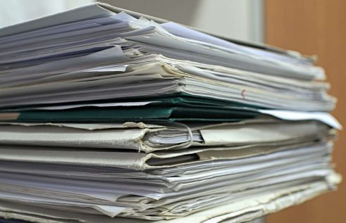 A picture depicting a stack of papers.
